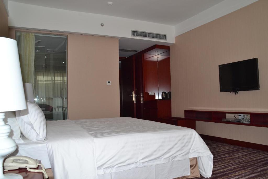 Elite Garden Hotel Yangshuo Quarto foto