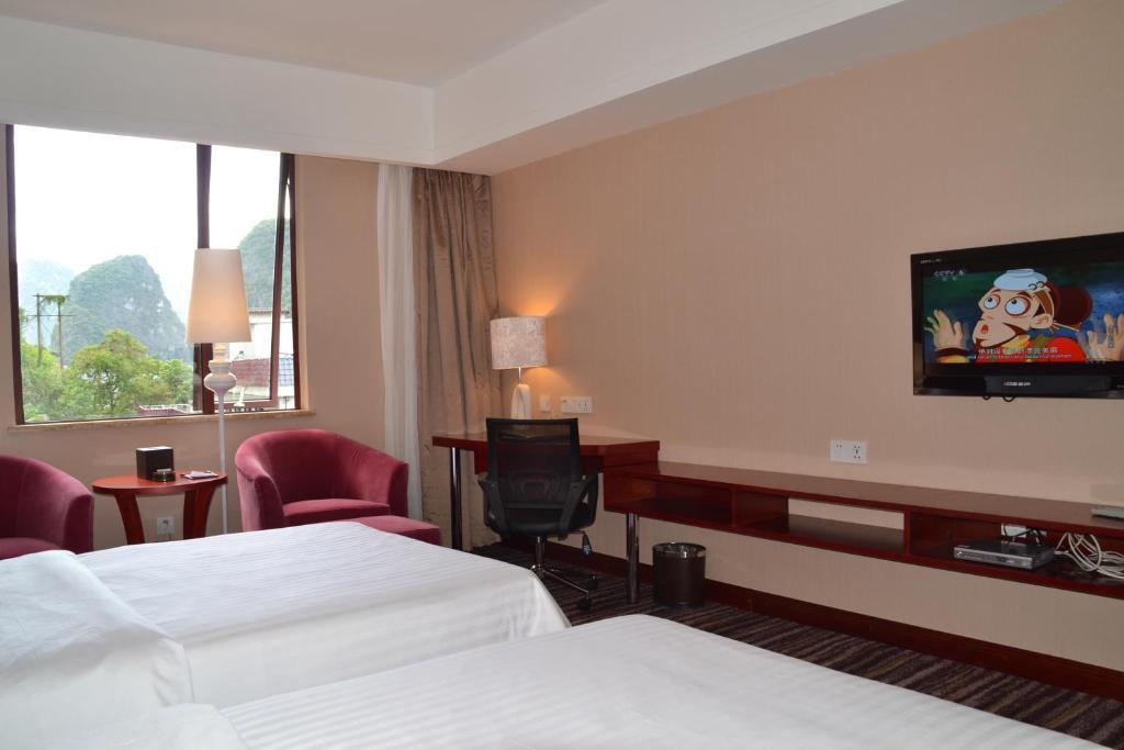 Elite Garden Hotel Yangshuo Quarto foto