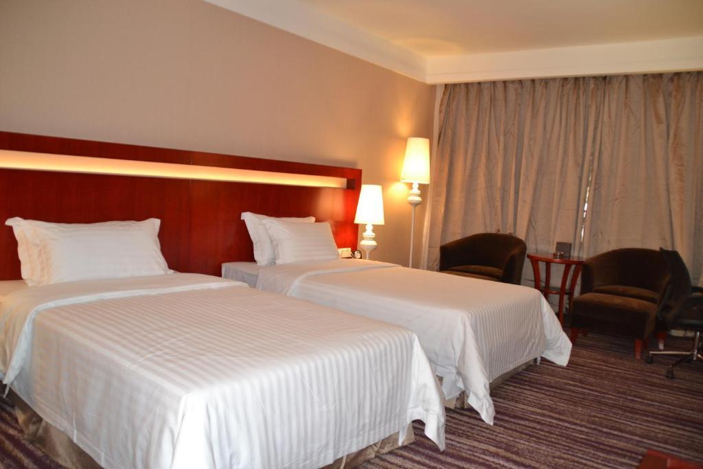 Elite Garden Hotel Yangshuo Quarto foto